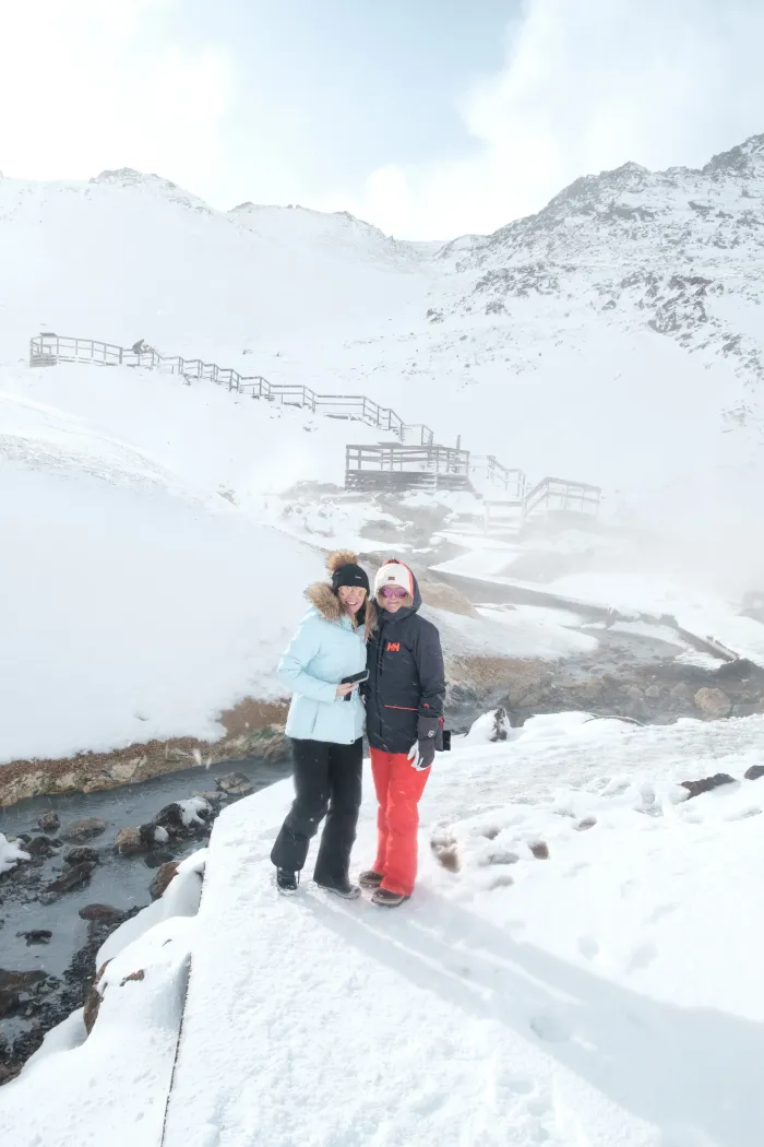 Steam rising over a hot spring in the Icelandic winter